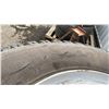 Image 2 : PALLET OF (4) 10.00-20 TIRES ON METAL TUBE TYPE RIMS