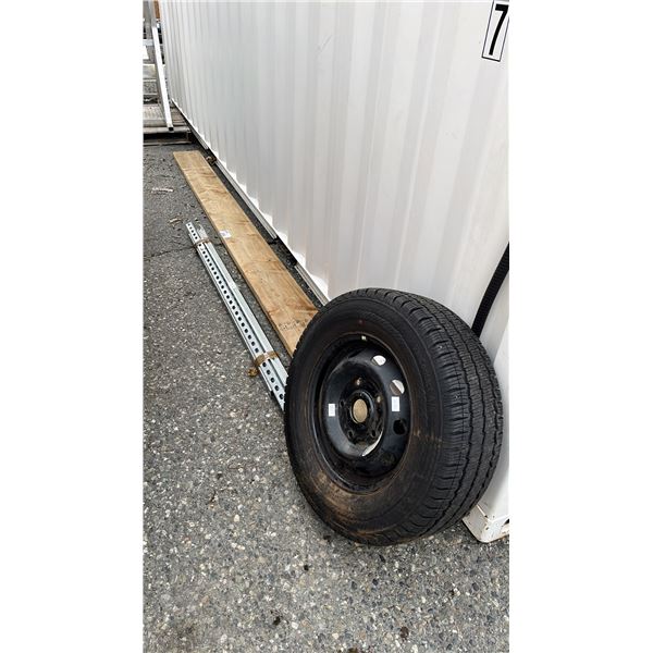 BUNDLE OF SLOTTED DIN RAILS, CONTINENTAL 235/65 R 16 C SPARE TIRE & 144.5" X 9.5" PIECE OF WOOD