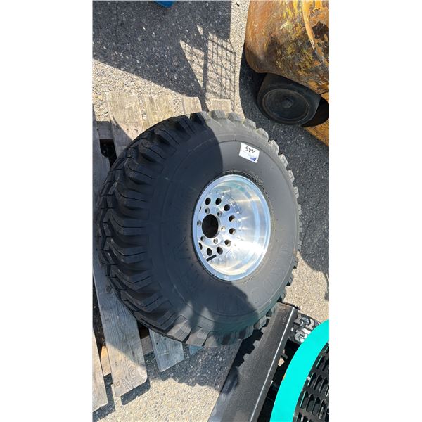 GROUND HAWG 15/38.5-15LT TIRE MOUNTED ON 6 BOLT METAL RIM