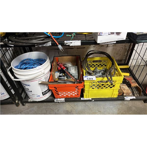 SHELF OF ASSORTED ITEMS INCLUDING; AXE HEADS, BRAIDED STEEL SLING, ROPE, DRILL BITS & MORE