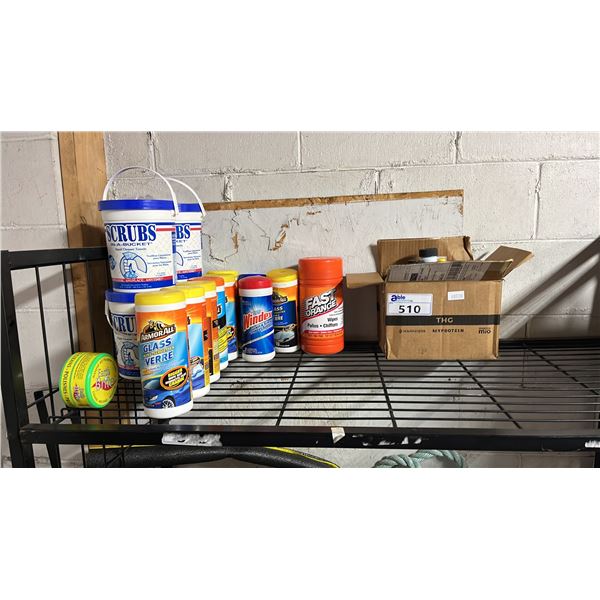 SHELF OF ASSORTED ITEMS INCLUDING; ARMORALL WIPES, FAST ORANGE WIPES, SCRUBS IN A BUCKET & MORE