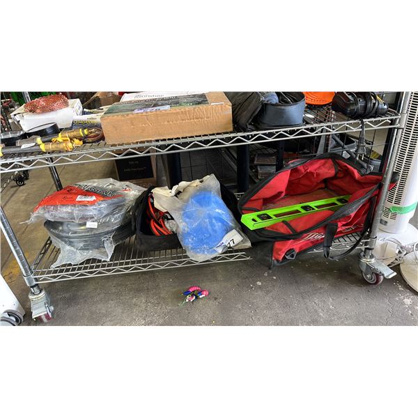 SHELF OF ASSORTED ITEMS INCLUDING; ELECTRICAL WHIP, BOOSTER CABLES, KNEE PADS & MORE