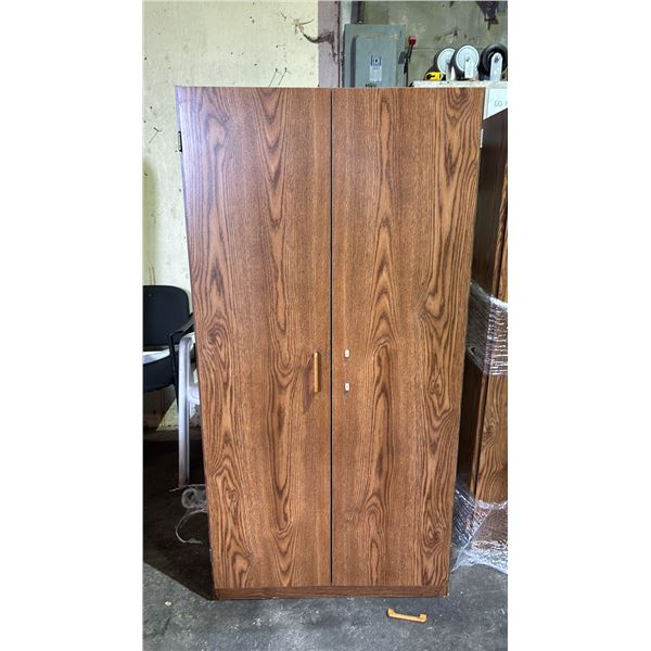 2 DOOR WOOD CABINET 29" X 15.5" X 60" (HANDLE BROKEN)