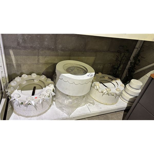 SHELF OF ASSORTED WEDDING CAKE DECOR