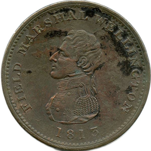 Lot of Two Wellington Tokens.
