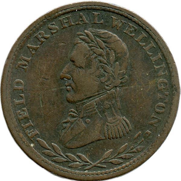 Lot of Twenty-Three Wellington Tokens.