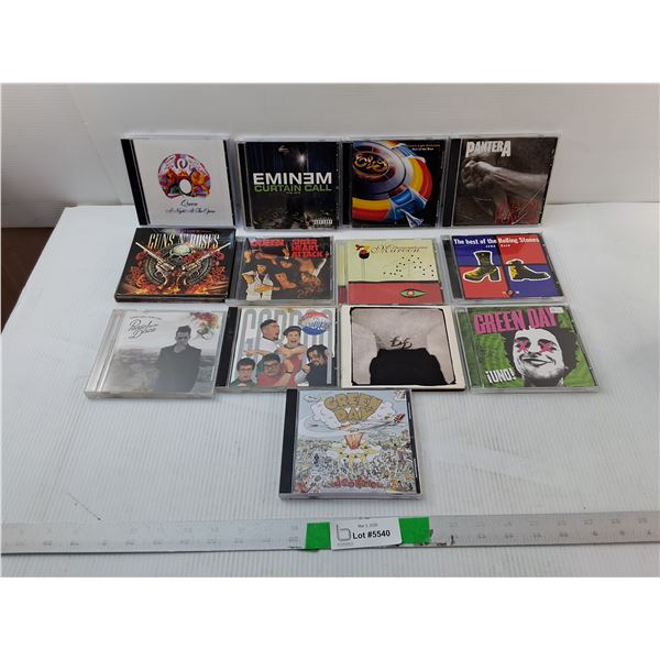 (13) CDs- Eminems, The Rolling Stones, Queen, Misc.