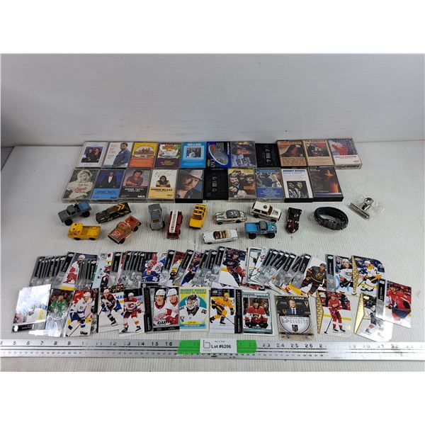 Assorted Hockey Cards, Die Cast Toy Cars, Audio Cassettes, Bracelet