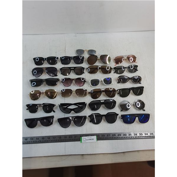 (25) Pairs of Sunglasses (A few Damaged)