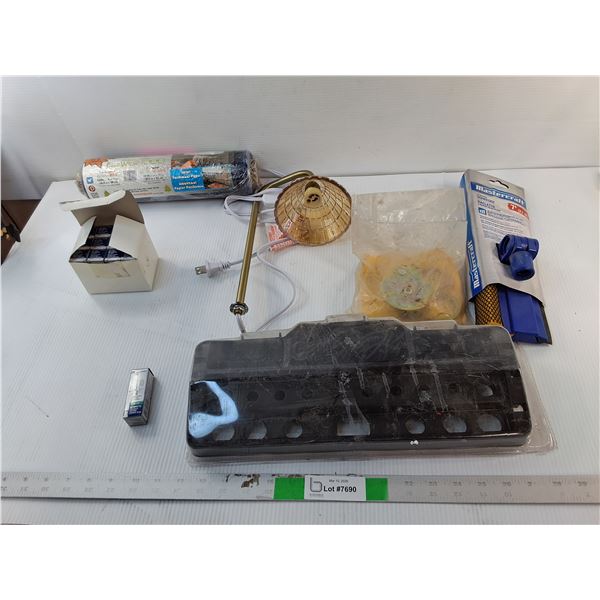 Roll of Ezee Wrap, 60W Halogen Bulbs, Mastercraft Squeegee, Misc.