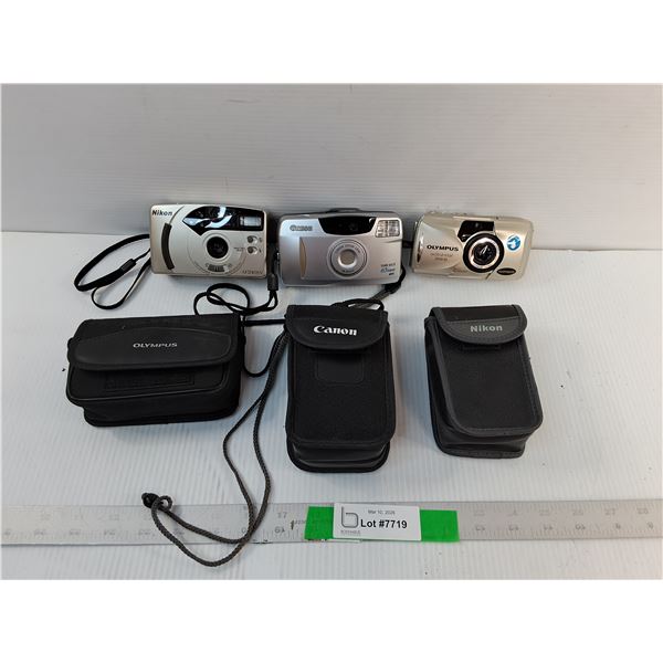 (3) Film Cameras- Canon, Olympus, Nikon- As Is & (3) Cases