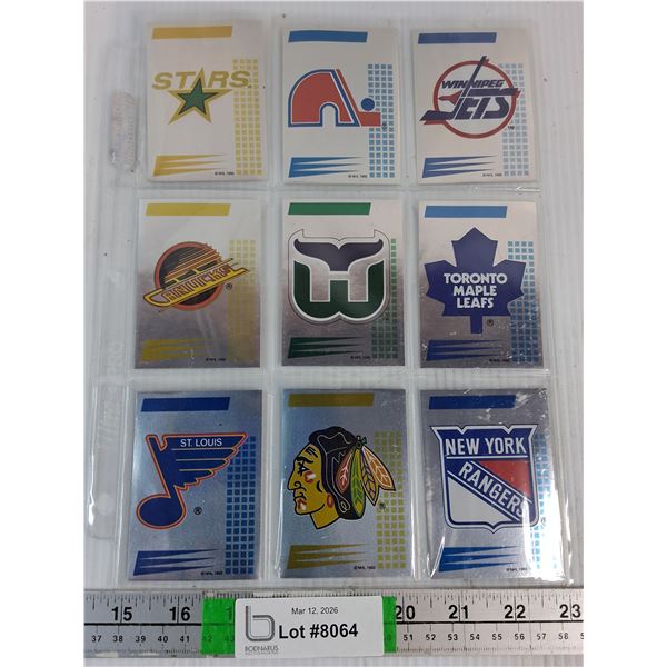 (9) Hockey Cards Featuring Vintage NHL Logos