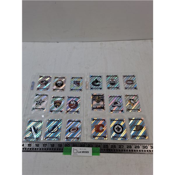 (18) Assorted NHL Silver Foil Team Logos
