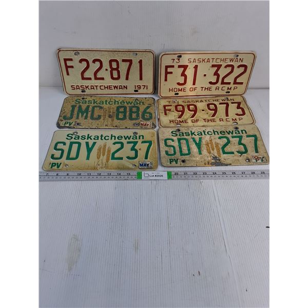 (6) Saskatchewan License Plates Including (2) 1973 Home of RCMP