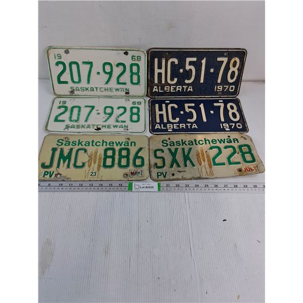(4) Saskatchewan License Plates and Pair of 1970 Alberta Plates