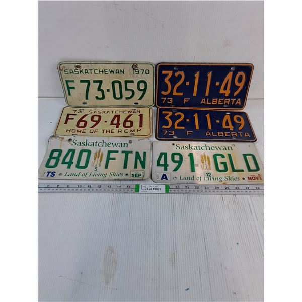 (4) Saskatchewan License Plates and Pair of 1973 Alberta Plates