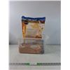 Image 1 : (2) Bags of Ground Walnut Shell Bedding ( partially full), Storage Bin With Lid ( cannot ship)