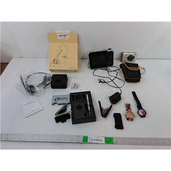 Mono Bluetooth Headset-Untested, RCA Alarm Clock- Powers On, Canon Digital Camera- As Is, Misc.