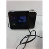 Image 6 : Mono Bluetooth Headset-Untested, RCA Alarm Clock- Powers On, Canon Digital Camera- As Is, Misc.