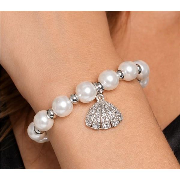 $100,  GENUINE FRESH WATER PEARL 7-8.5"BRACELET, retail value $100