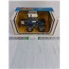 Image 1 : 1:32 ERTL Ford Die-Cast 4-Wheel Drive Tractor (NIB)
