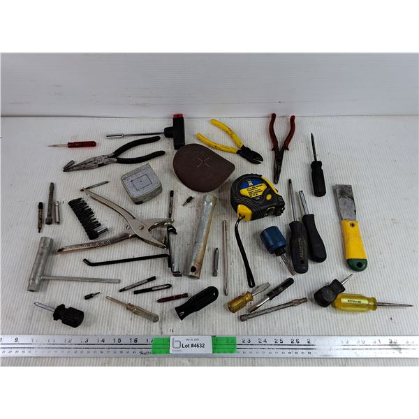 Leather Punch, Needle Nose Pliers, Power First Measuring Tape, Wire Cutters, Bits, Misc