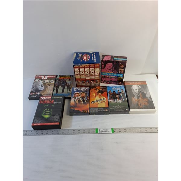 Vintage VHS/Assorted DVD  - Rocky I thru V,  Misc.