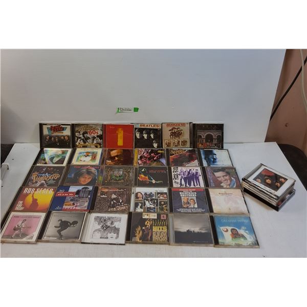 (42)Discs- The Beatles, Rush, Cat Stevens, Elvis, Red Rider, 60's Greatest, Bob Seger, Neil Young