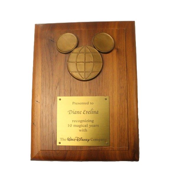A Cast Member 10 Years of Service Plaque.