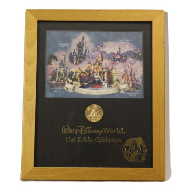 A Walt Disney World Cast Framed Print and Coin.