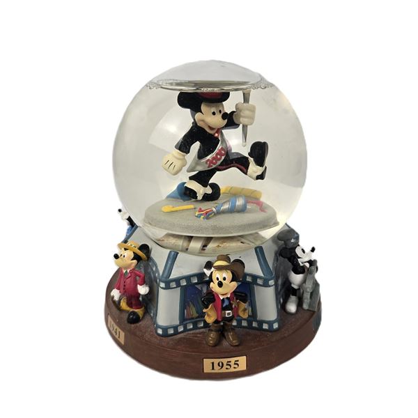 A Milennium Mickey Snow Globe.