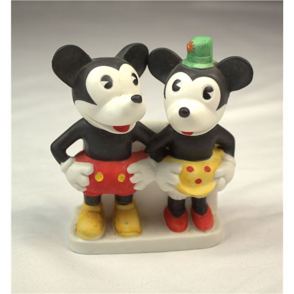 A rare reproduction of a 1930s Pie-eyed Mickey and Minnie Mouse Bisque toothbrush holder.
