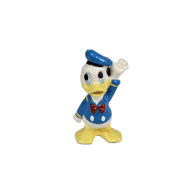 A Vintage Donald Duck Ceramic Figurine.