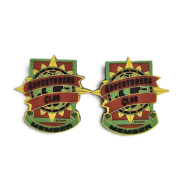 A Pair of Adventurers Club Lapel Pins.