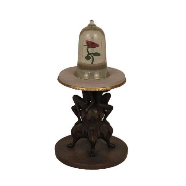 An Enchanted Rose Figurine.