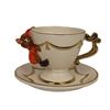 Image 1 : A Jaq Teacup and Saucer Set.