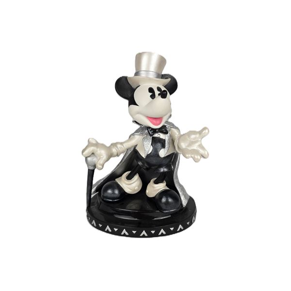 A Mickey Mouse “Stepping Out” Figurine.
