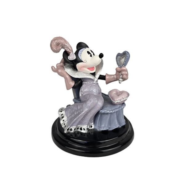 A Minnie Mouse “Steppin Out” Figurine.