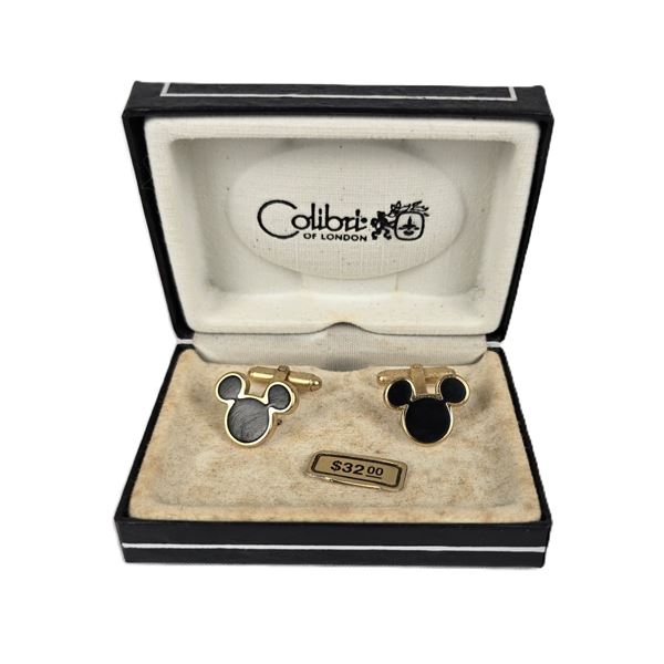 A Pair of Vintage Black and Gold Mickey Icon Cuff Links.