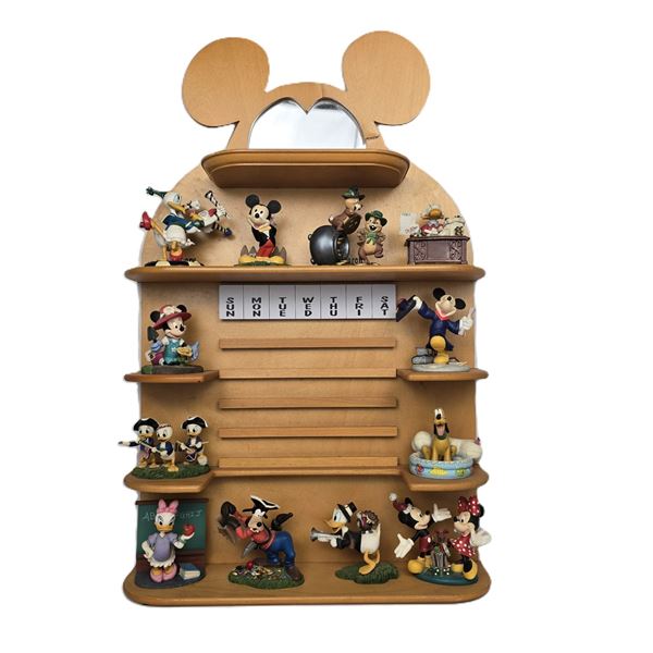 A Twelve (12) Piece Disney Characters Perpetual Calendar.