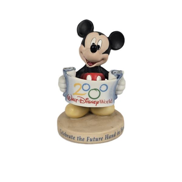 A 2000 Mickey Mouse Ceramic Annual Celebration Figurine.