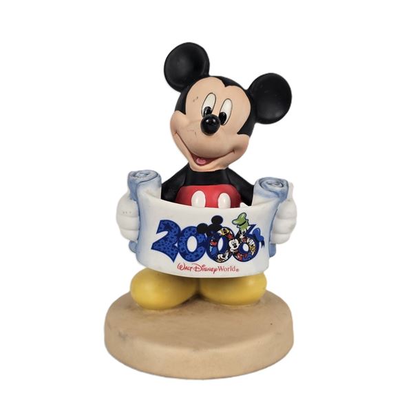 A 2006 Mickey Mouse Ceramic Annual Celebration Figurine.