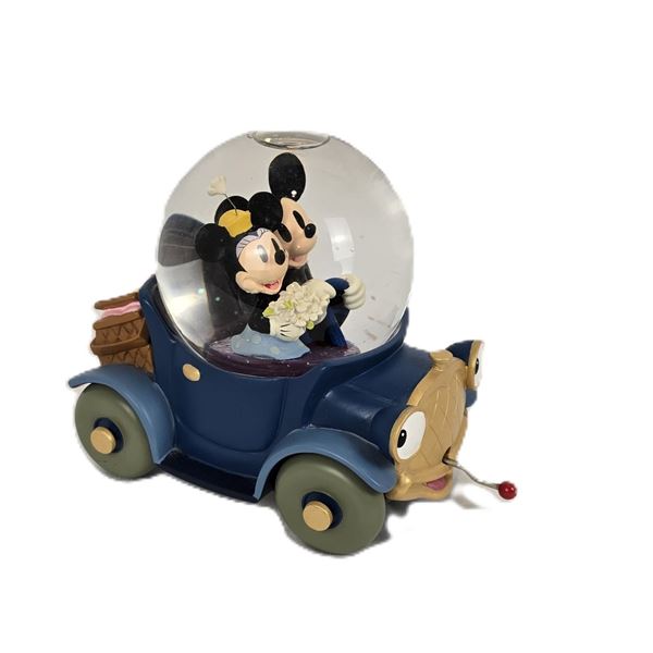 A Mickey and Minnie Mouse Musical Car Music Box.