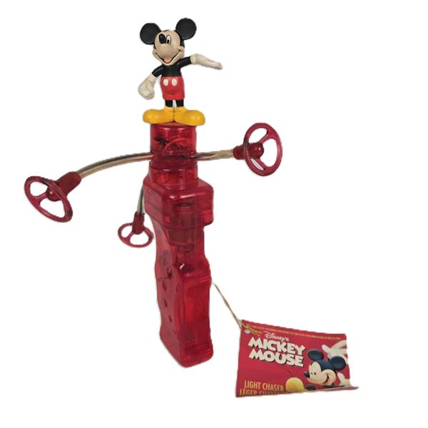 A Mickey Mouse Light Chaser Toy.
