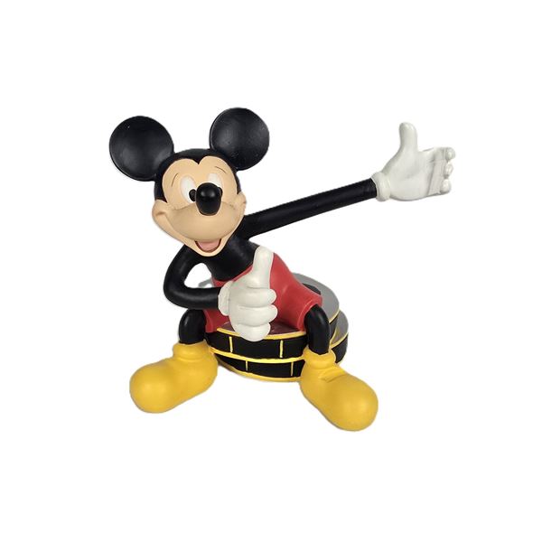 A Mickey Mouse On Film Reel Figurine.