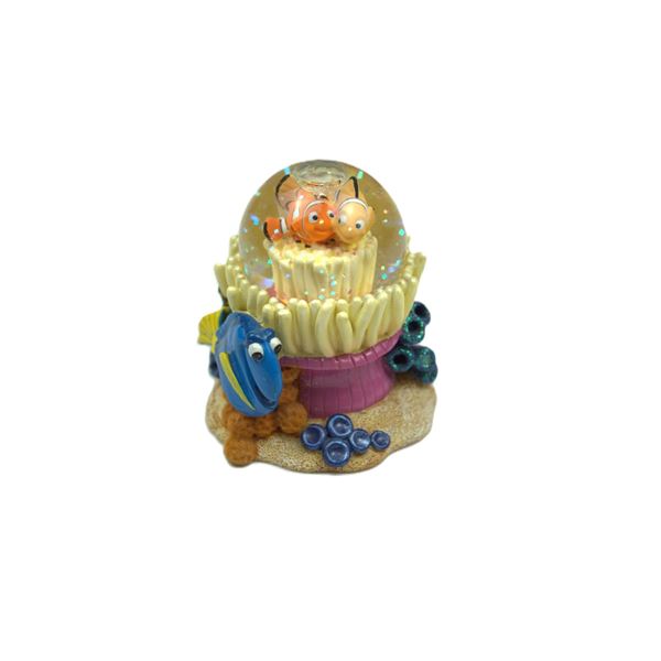 A Disney Parks Finding Nemo snow globe.