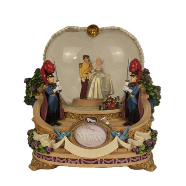A Cinderella Wedding Photo Frame Snow Globe.