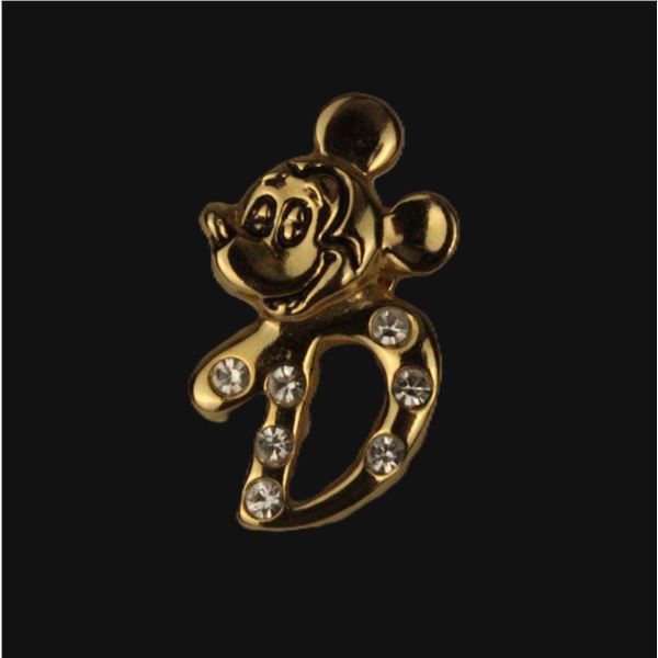 A Gold-toned Mickey Mouse 'D' Hat Pin.