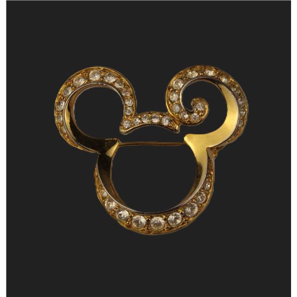 A Gold-toned Mickey Ear Hat Broach with Swarovski Crystals.