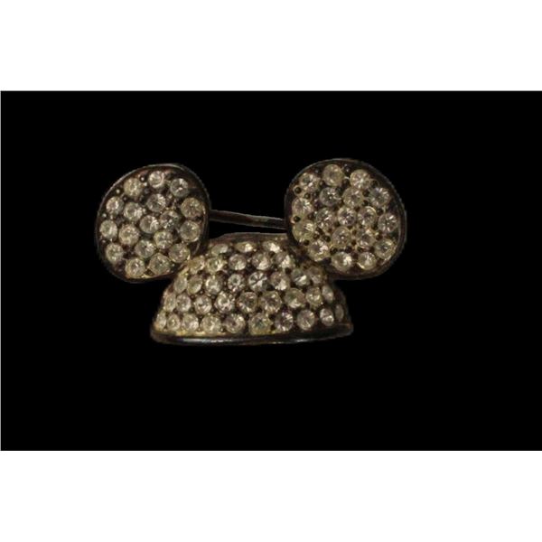A Gold-toned Mickey Ear Hat Broach with Swarovski Crystals.